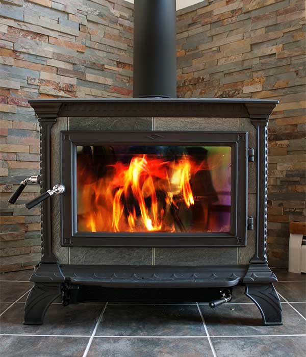 Fire Burning in a Wood Stove stock images - better to let a professional install - Rutland Chimney
