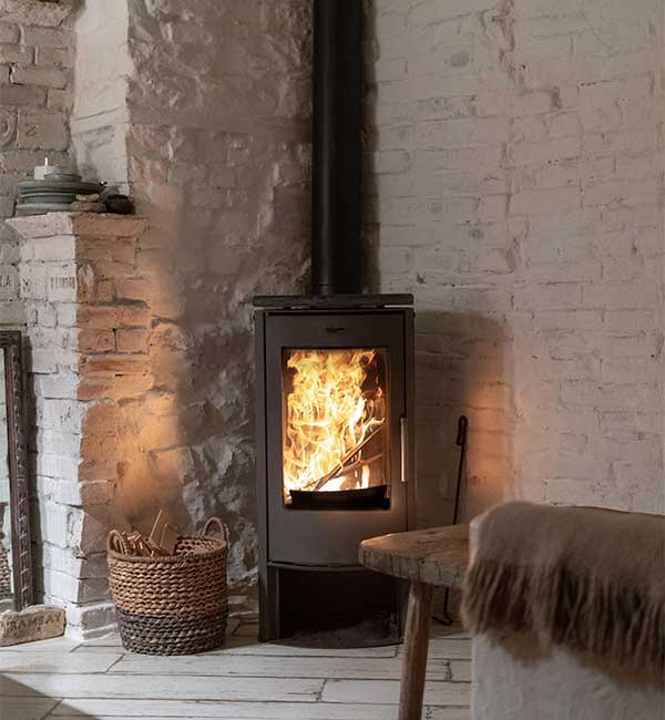 Wood stove fireplace in a cozy house